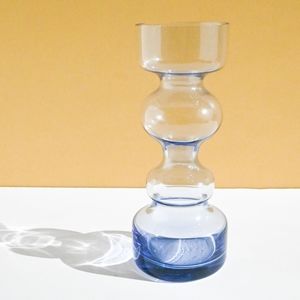 Mid century modern curvy blue glass candle holder